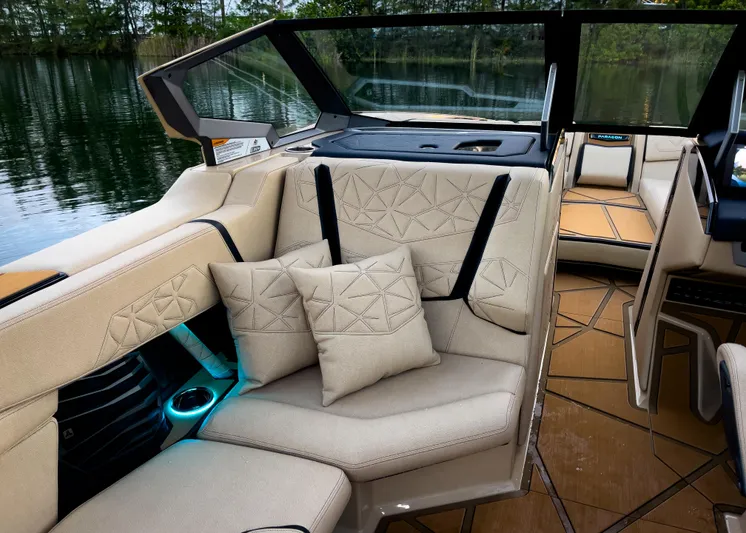  Yacht Photos Pics Luxurious interior of 2026 Nautique Paragon G25 boat with plush seating and elegant design.