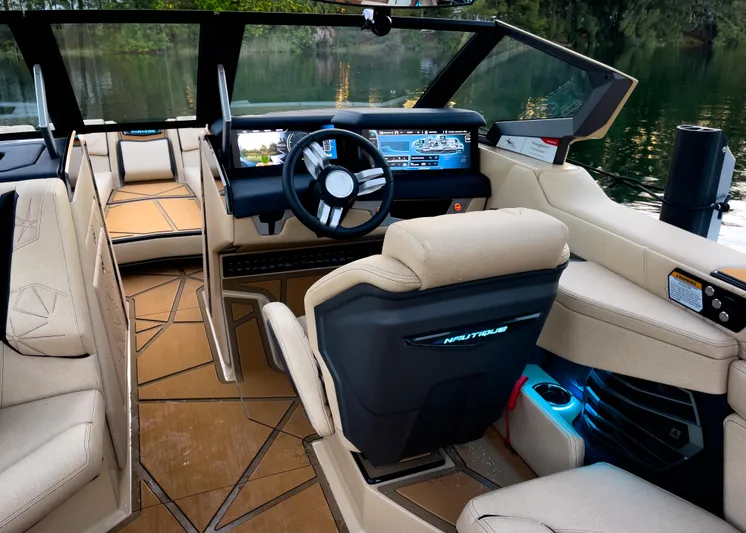  Yacht Photos Pics 2026 Nautique Paragon G25 interior with modern dashboard and luxurious seating.