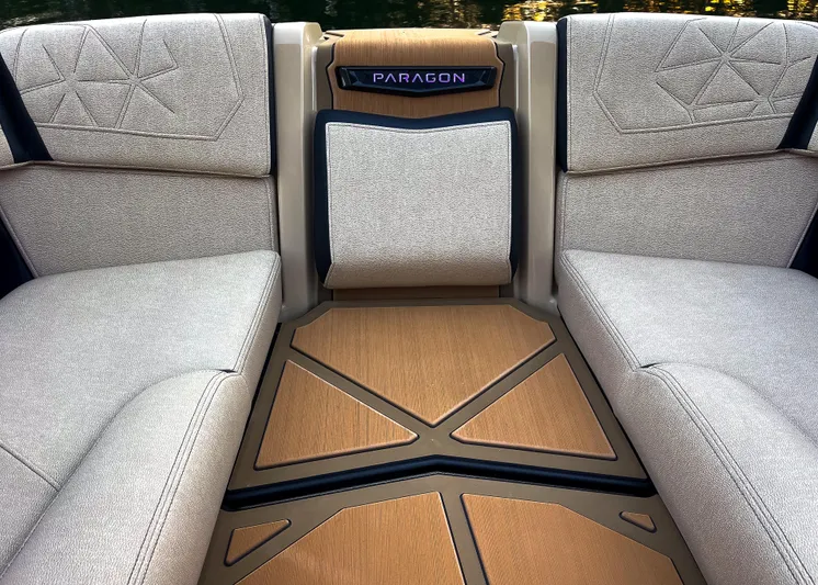  Yacht Photos Pics Interior of 2026 Nautique Paragon G25 boat with luxurious seating and stylish flooring.