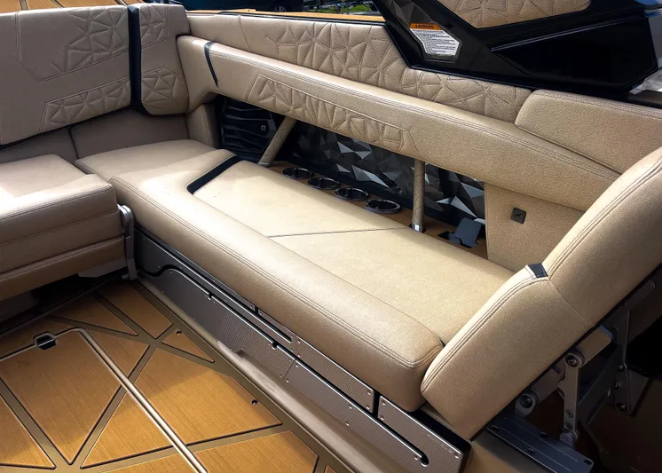  Yacht Photos Pics 2026 Nautique Paragon G25 interior with luxurious beige seating and geometric design.