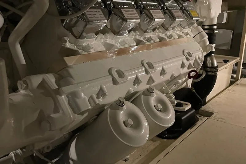  Yacht Photos Pics Engine room of a 2015 Riva Rivale 52 yacht, showcasing a detailed view of the engine components.