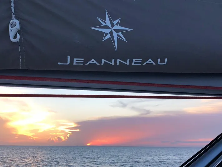 Mi Akumal Yacht Photos Pics Jeanneau Sun Odyssey 40.3 sailboat at sunset, ocean view, 2011 model.