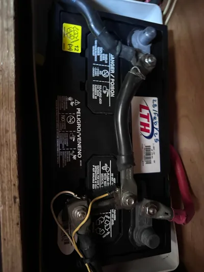 Mi Akumal Yacht Photos Pics Battery in Jeanneau Sun Odyssey 40.3 yacht, 2011 model, with LTH branding and cables connected.