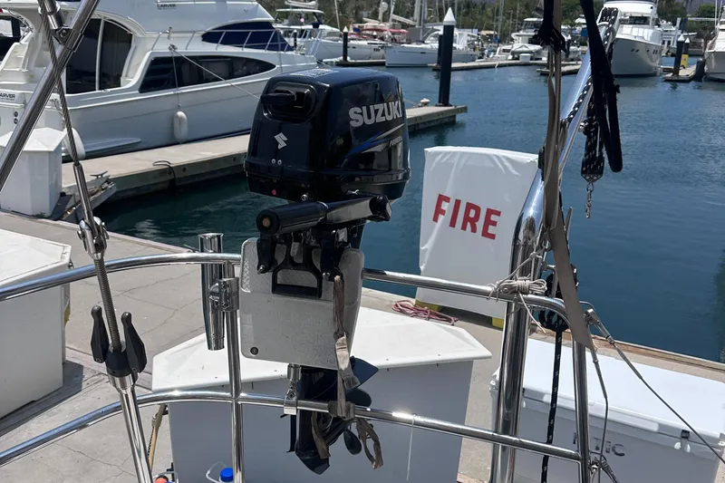Mi Akumal Yacht Photos Pics Suzuki outboard motor on Jeanneau Sun Odyssey 40.3, docked at marina, 2011 model.