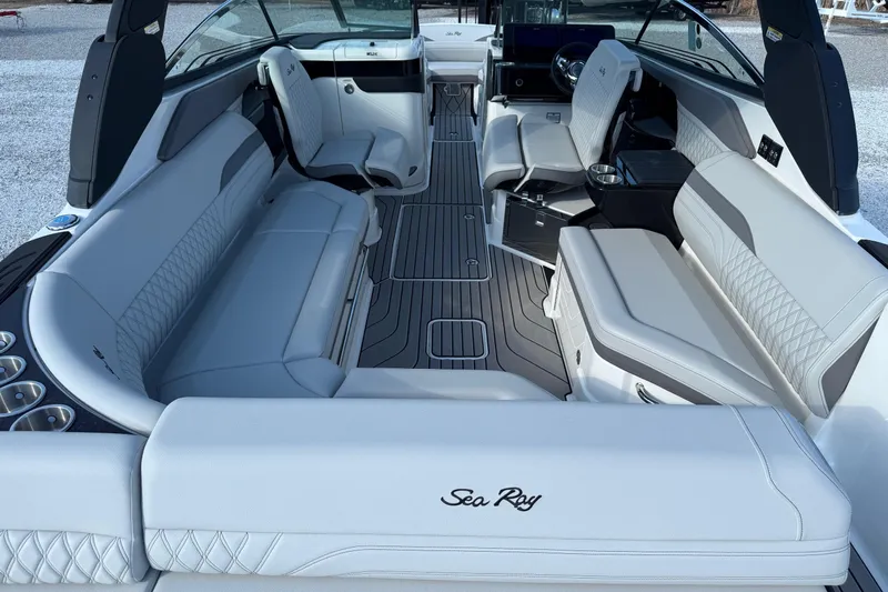  Yacht Photos Pics 2026 Sea Ray SLX 280 boat interior with luxurious seating and modern design.