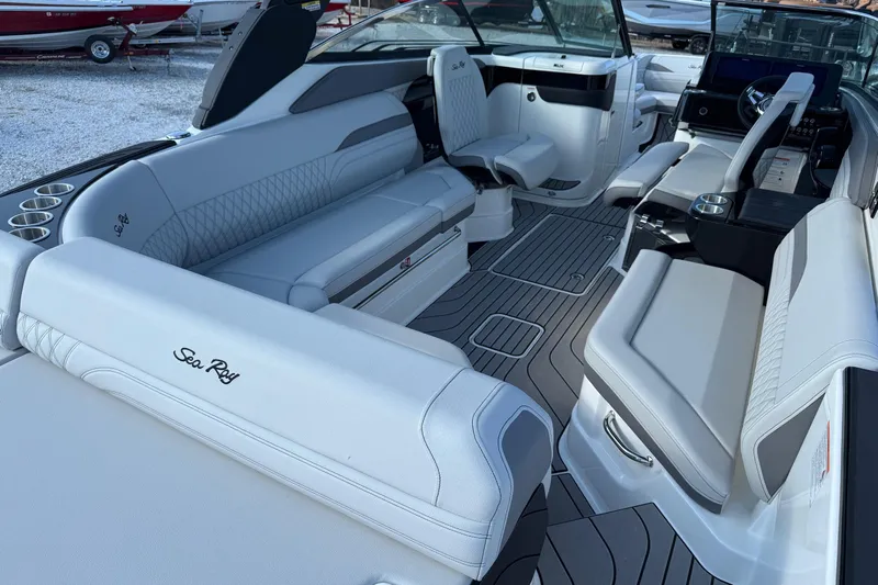  Yacht Photos Pics 2026 Sea Ray SLX 280 boat interior with luxurious seating and modern design.