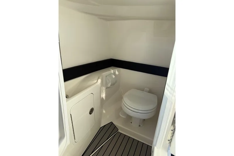  Yacht Photos Pics 2026 Sea Ray SLX 280 boat interior with modern marine toilet and sleek design.