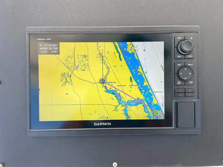Islander 7 Yacht Photos Pics Garmin GPS display on 1988 Bertram 43 Convertible boat, showing nautical map.