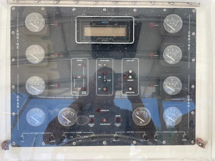 Islander 7 Yacht Photos Pics Control panel of a 1988 Bertram 43 Convertible boat with gauges and switches.