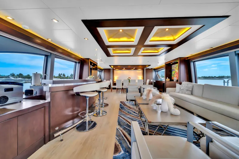  Yacht Photos Pics Luxurious interior of a 2012 Azimut 116 yacht with modern furnishings and panoramic windows.