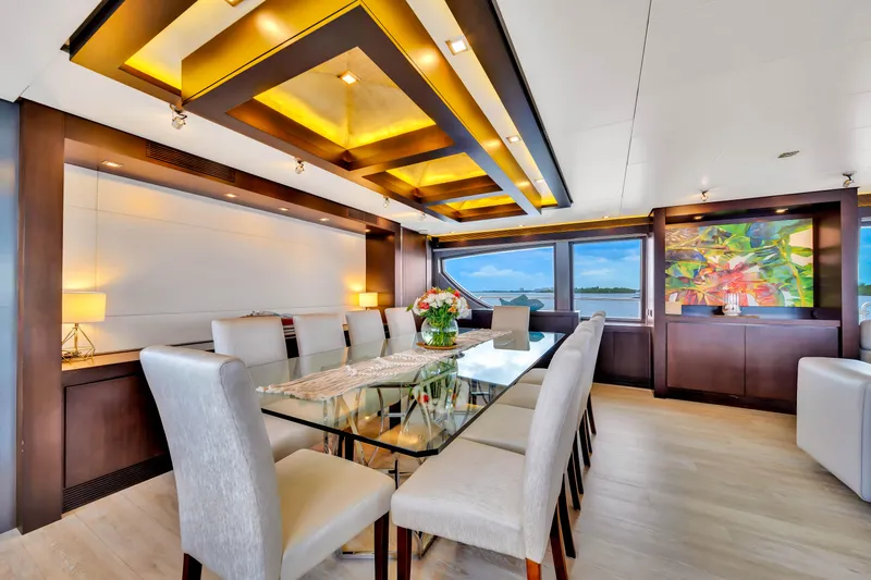 Yacht Photos Pics Luxurious dining area on 2012 Azimut 116 yacht with elegant decor and panoramic windows.