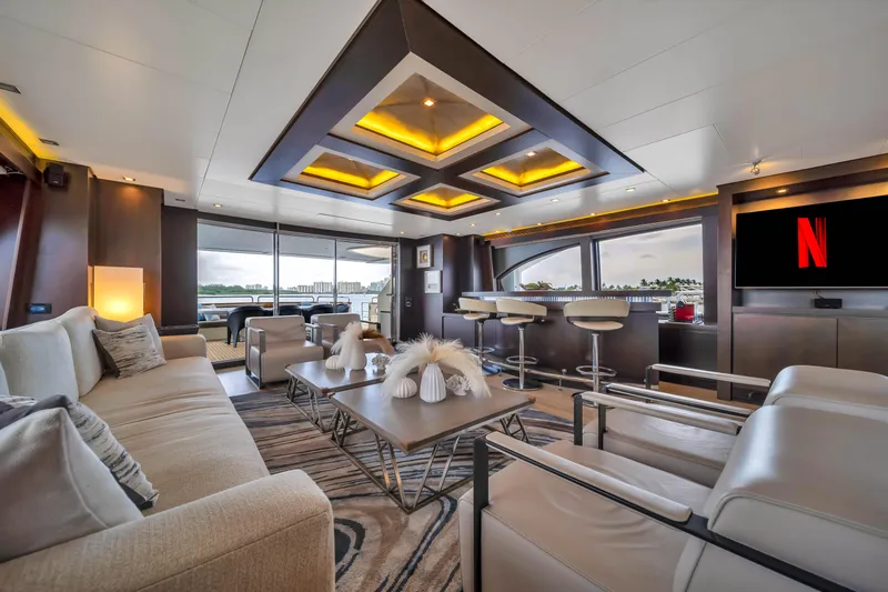  Yacht Photos Pics Luxurious interior of 2012 Azimut 116 yacht with modern furnishings and large windows.