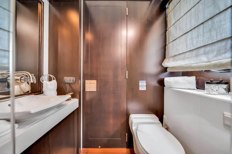  Yacht Photos Pics Luxurious bathroom interior on 2012 Azimut 116 yacht, featuring modern fixtures and elegant design.