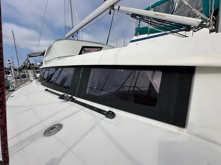 Doc Holiday Yacht Photos Pics 2012 Beneteau Sense 43 sailboat deck with sleek windows and rigging.