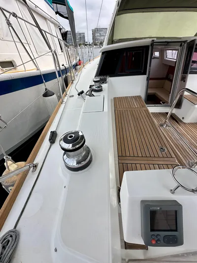 Doc Holiday Yacht Photos Pics Beneteau Sense 43 yacht deck with winches and teak flooring, 2012 model.