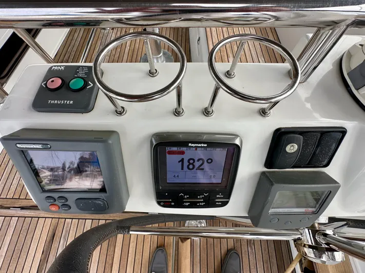 Doc Holiday Yacht Photos Pics Beneteau Sense 43 yacht dashboard with navigation instruments and thruster controls, 2012 model.
