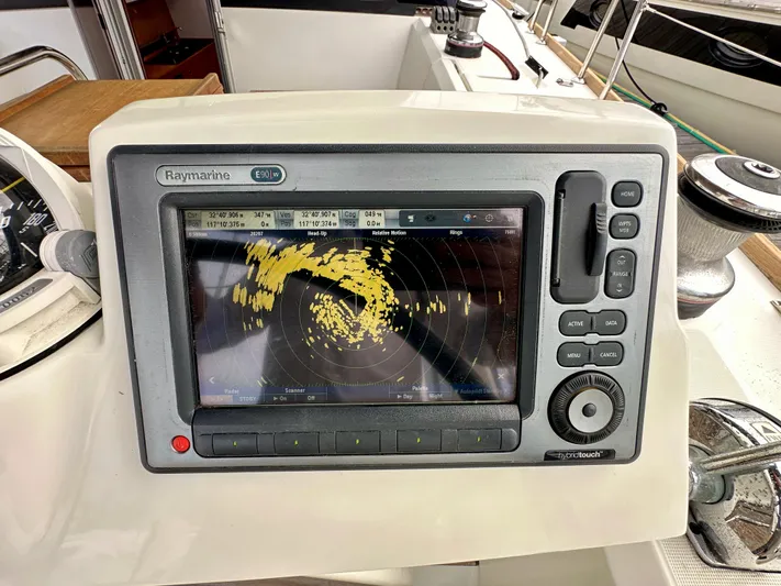 Doc Holiday Yacht Photos Pics Raymarine E90W radar display on 2012 Beneteau Sense 43 yacht dashboard.
