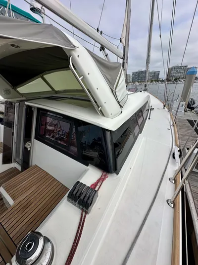 Doc Holiday Yacht Photos Pics 2012 Beneteau Sense 43 sailboat docked, featuring sleek design and spacious deck.