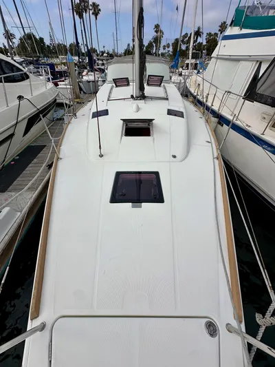 Doc Holiday Yacht Photos Pics 2012 Beneteau Sense 43 sailboat docked at marina, top deck view.
