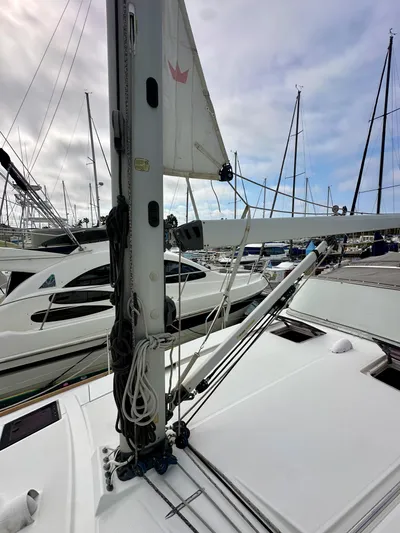 Doc Holiday Yacht Photos Pics 2012 Beneteau Sense 43 sailboat mast and rigging in marina setting.