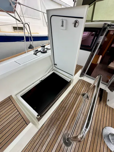 Doc Holiday Yacht Photos Pics Beneteau Sense 43 yacht deck with open storage compartment, 2012 model.