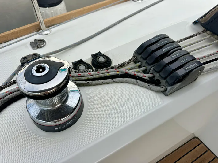 Doc Holiday Yacht Photos Pics Winch and rope clutches on 2012 Beneteau Sense 43 sailboat deck.