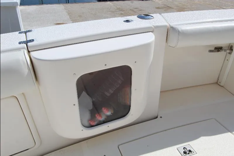  Yacht Photos Pics Storage compartment on a 2005 Riviera 46 Convertible Sportfisher boat deck.