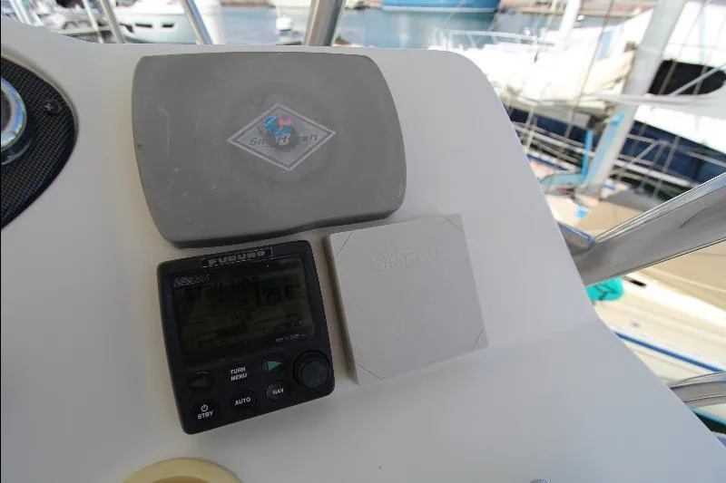  Yacht Photos Pics Control panel of a 2005 Riviera 46 Convertible Sportfisher boat, featuring navigation equipment.