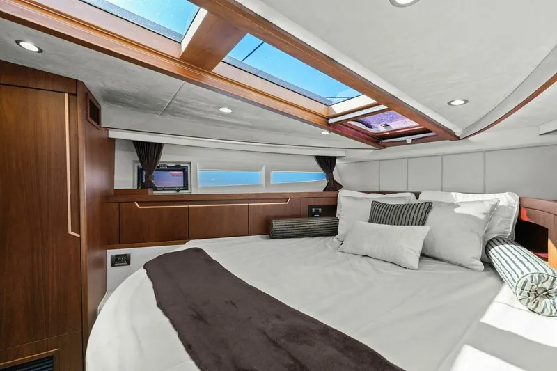 Board Room Yacht Photos Pics Luxurious interior of 2017 Galeon 385 HTS yacht with skylight and modern design.