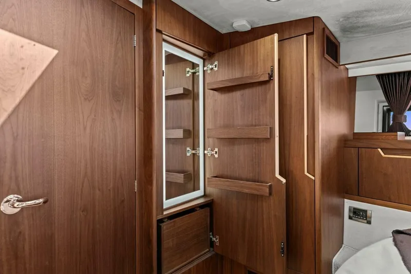 Board Room Yacht Photos Pics Interior of 2017 Galeon 385 HTS yacht featuring elegant wooden cabinetry and modern design.
