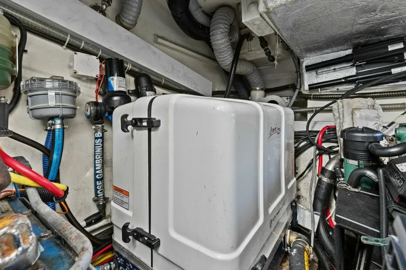 Board Room Yacht Photos Pics Engine room of 2017 Galeon 385 HTS yacht with various mechanical components.