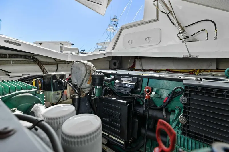 Board Room Yacht Photos Pics Engine compartment of 2017 Galeon 385 HTS yacht, showcasing mechanical components and wiring.