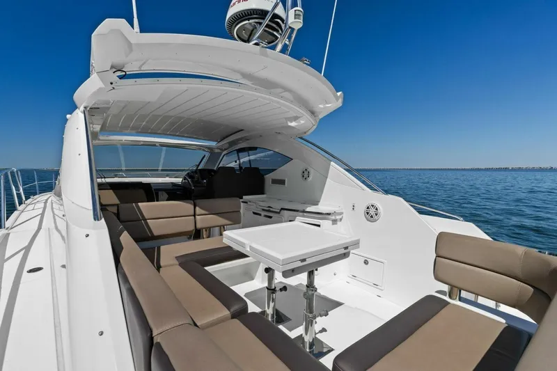 Board Room Yacht Photos Pics 2017 Galeon 385 HTS yacht with spacious seating area on open water.