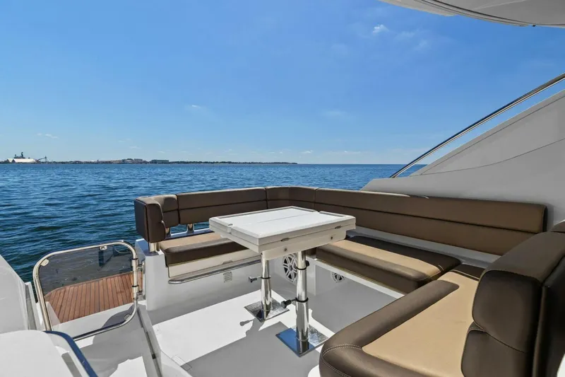 Board Room Yacht Photos Pics Luxury seating area on 2017 Galeon 385 HTS yacht with ocean view.