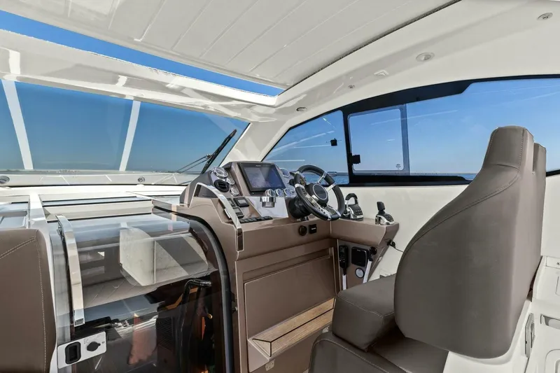 Board Room Yacht Photos Pics Interior of 2017 Galeon 385 HTS yacht, featuring modern helm and luxurious seating.