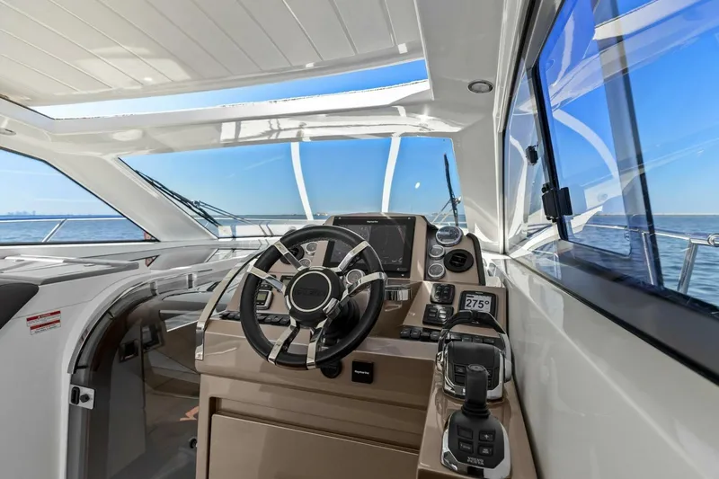 Board Room Yacht Photos Pics 2017 Galeon 385 HTS yacht helm with modern controls and ocean view.