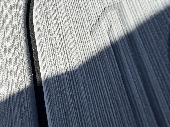  Yacht Photos Pics Close-up of textured surface on 2025 Nautique Super Air Nautique G23 boat.