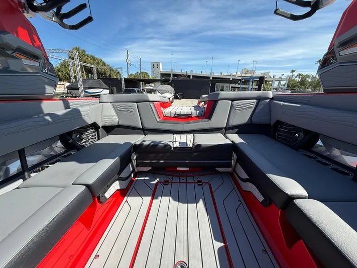  Yacht Photos Pics 2025 Nautique Super Air Nautique G23 interior with sleek seating and modern design.