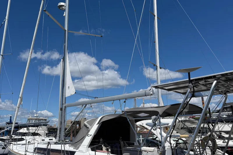 Wind Waker Yacht Photos Pics 2013 Beneteau Oceanis 41 sailboat docked under a clear blue sky.