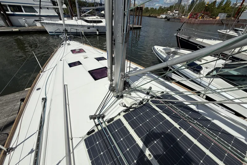 Wind Waker Yacht Photos Pics 2013 Beneteau Oceanis 41 sailboat docked, featuring solar panels and rigging.