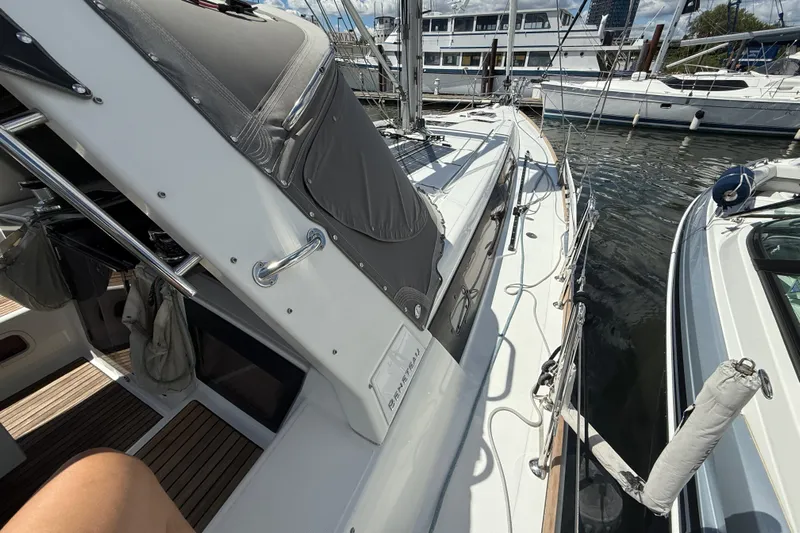 Wind Waker Yacht Photos Pics 2013 Beneteau Oceanis 41 sailboat docked at marina, showcasing deck and rigging.