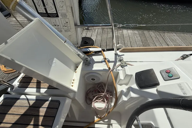 Wind Waker Yacht Photos Pics Cockpit view of 2013 Beneteau Oceanis 41 sailboat with ropes and control panel.