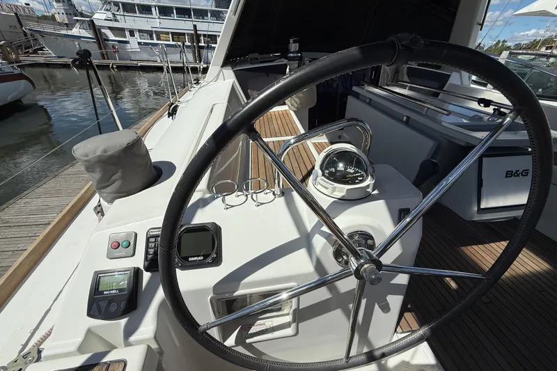 Wind Waker Yacht Photos Pics Steering wheel and controls of 2013 Beneteau Oceanis 41 sailboat at dock.