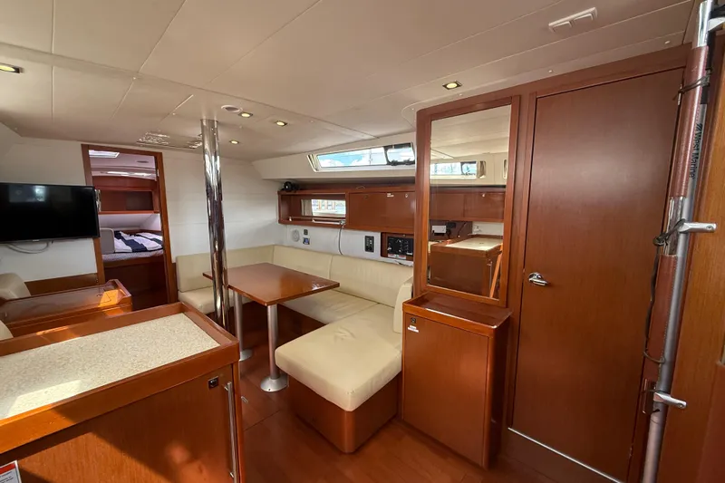 Wind Waker Yacht Photos Pics Interior of 2013 Beneteau Oceanis 41 yacht with cozy seating and modern amenities.