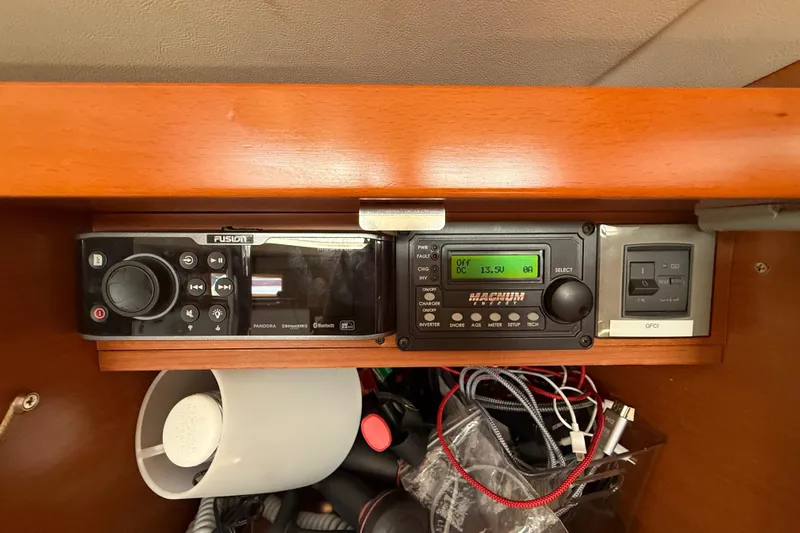 Wind Waker Yacht Photos Pics Control panel inside a 2013 Beneteau Oceanis 41 yacht, featuring audio and electrical systems.