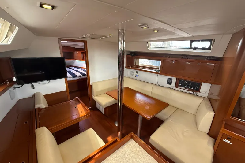 Wind Waker Yacht Photos Pics Interior of 2013 Beneteau Oceanis 41 yacht with cozy seating and modern amenities.