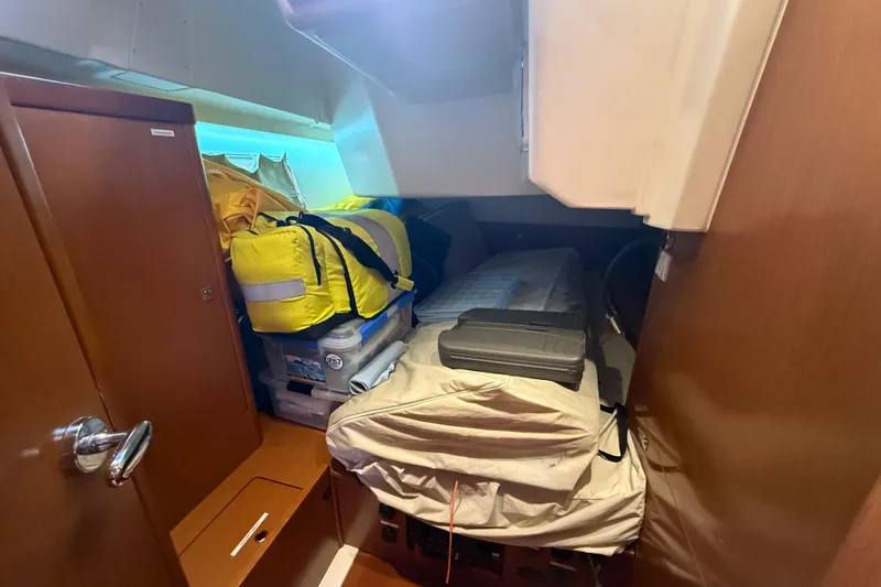 Wind Waker Yacht Photos Pics Interior cabin of 2013 Beneteau Oceanis 41 yacht with storage and equipment.