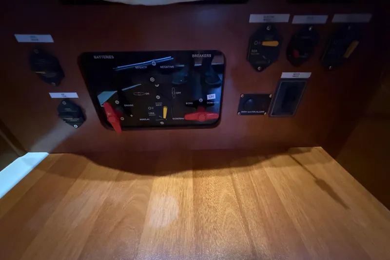 Wind Waker Yacht Photos Pics Control panel of a 2013 Beneteau Oceanis 41 sailboat, featuring battery and breaker switches.