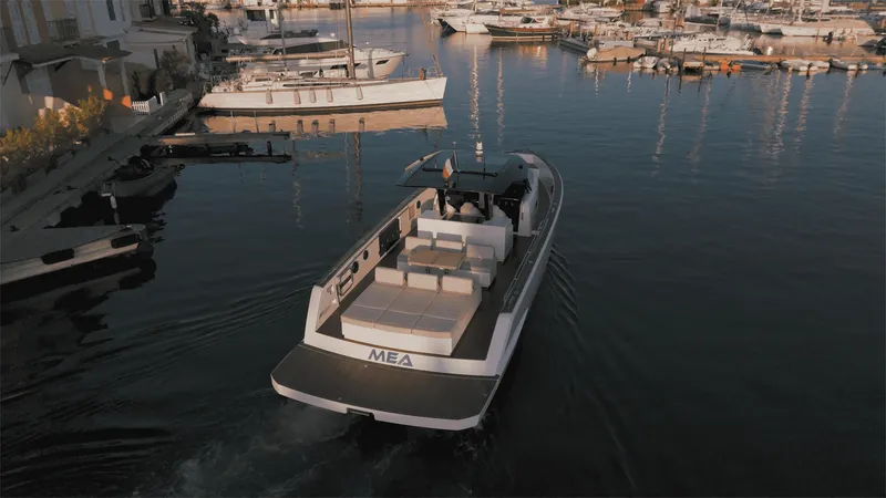 Mea Yacht Photos Pics 2022 Pardo Yachts 43 cruising in a marina, showcasing sleek design and luxury features.