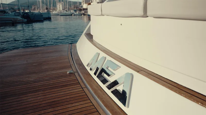 Mea Yacht Photos Pics 2022 Pardo Yachts 43 with wooden deck, docked in a marina.